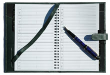 green leather journal cover with wirebound address book